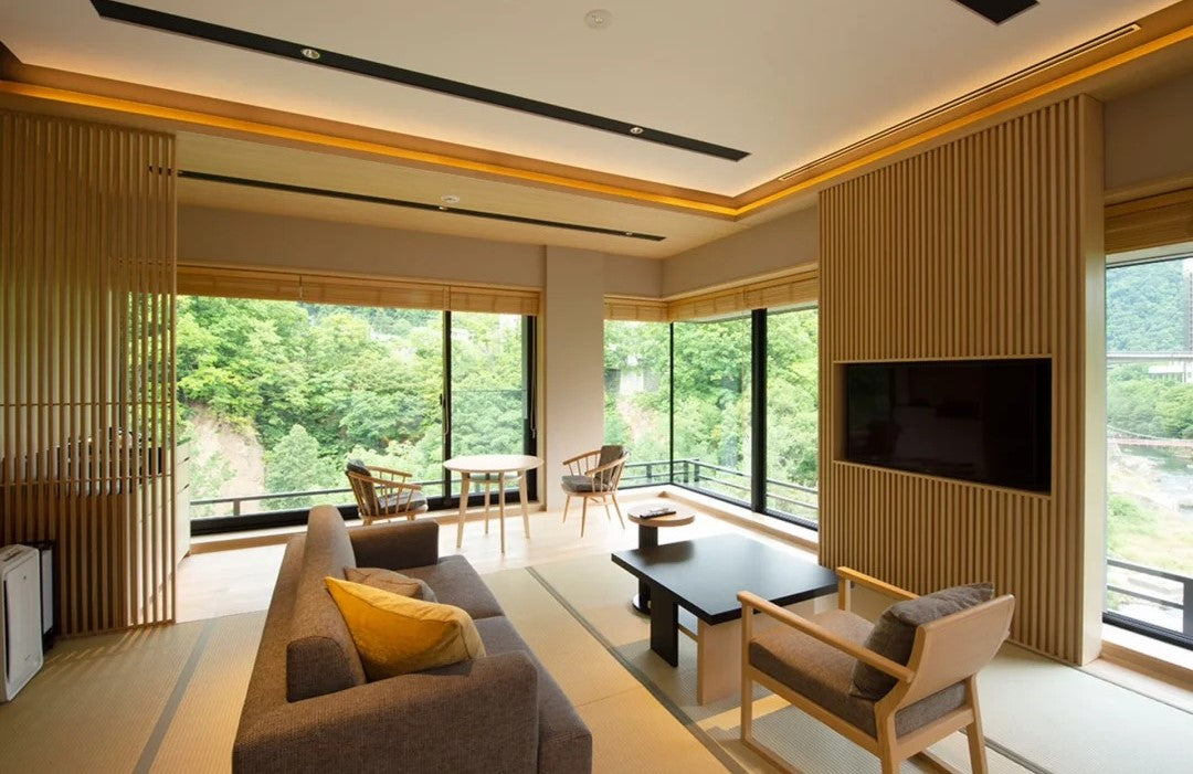Chalet Ivy Jozankei suite with tatami flooring and river valley views